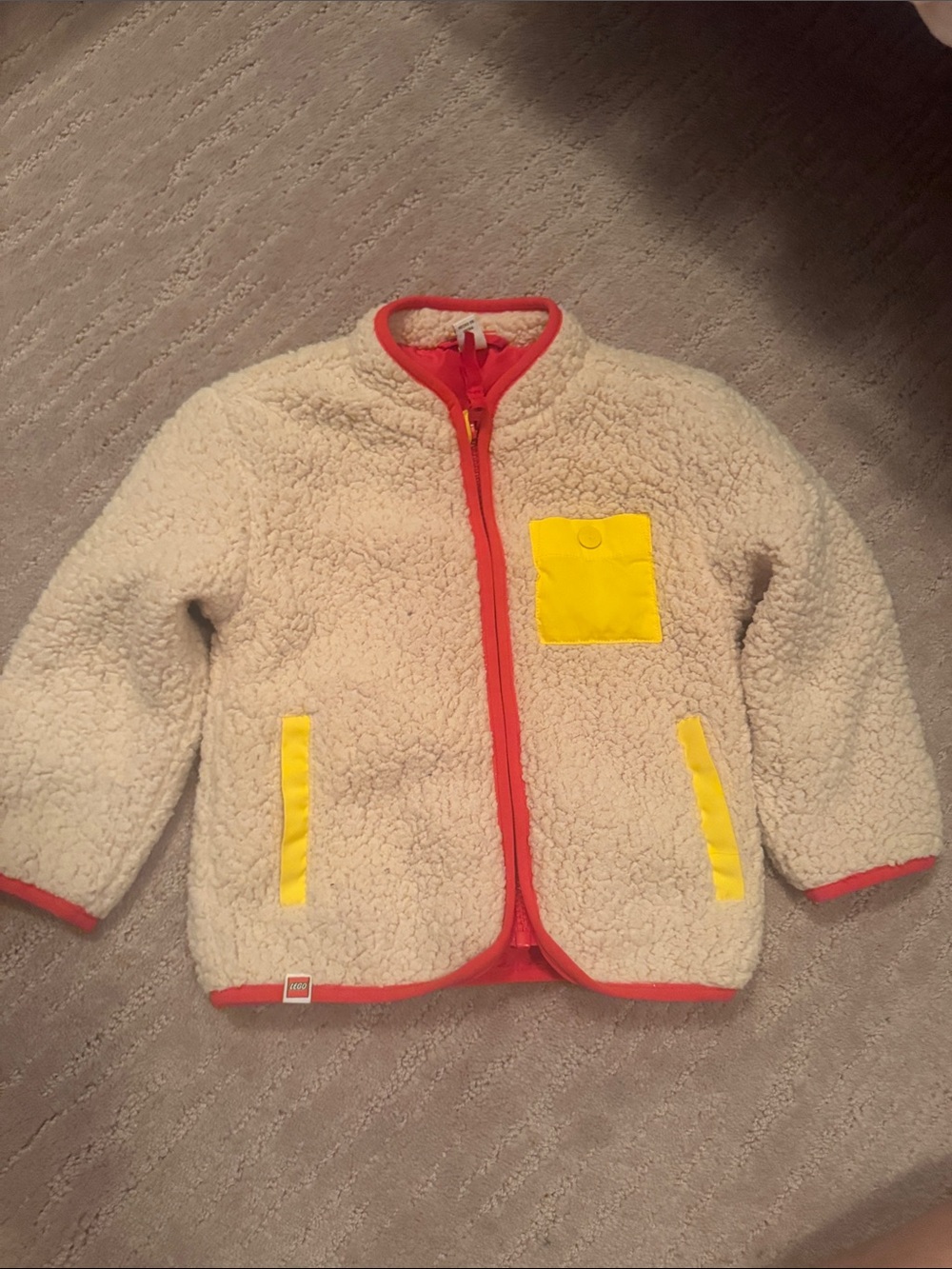 Lego Cream Sherpa Jacket with Yellow Accents and Red Trim